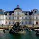 A room at Beijing’s Chateau Laffitte Castle Hotel now costs less than one at the Holiday Inn in Newark, New Jersey.
